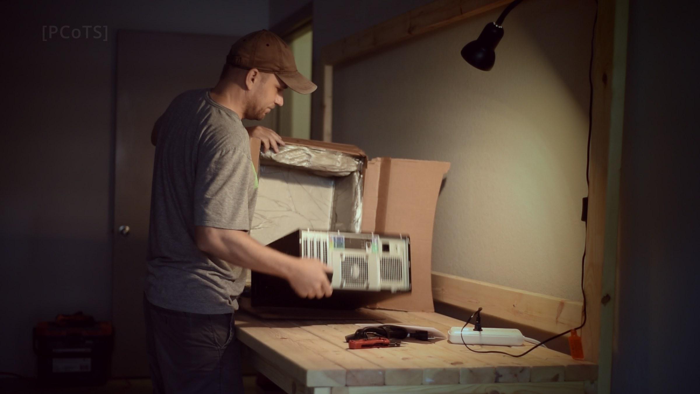 Lifting the OptiPlex 990 out of its shipping box