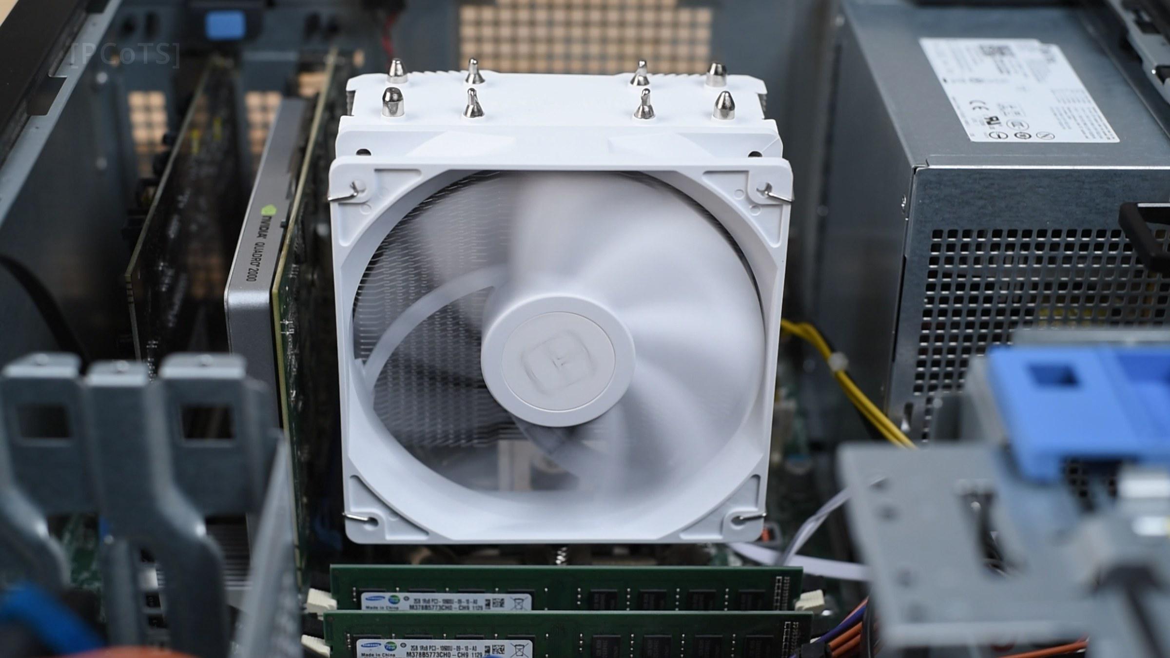 The new white cooler installed in the case