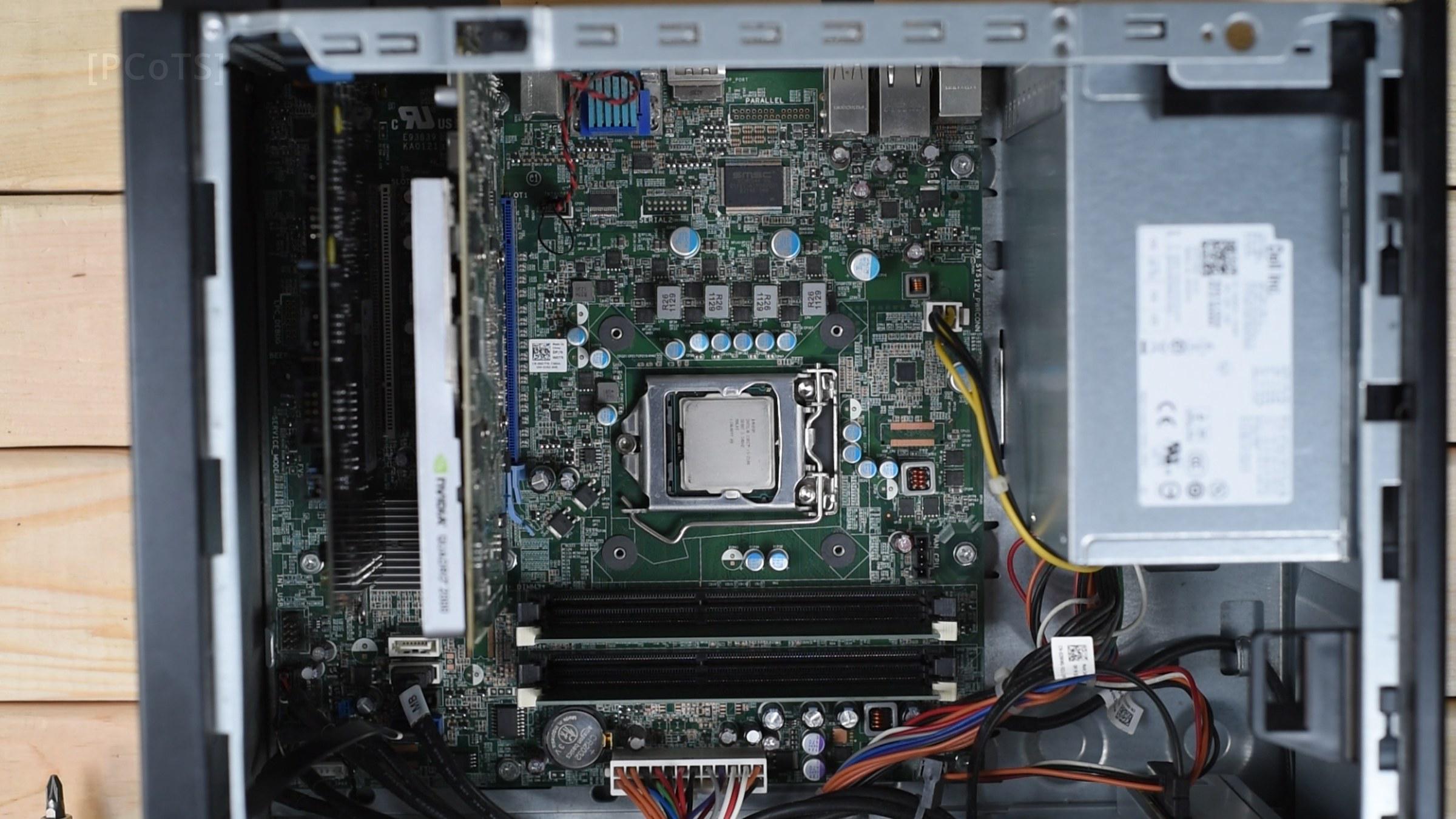 The board with the cooler off, bare LGA1155 socket area