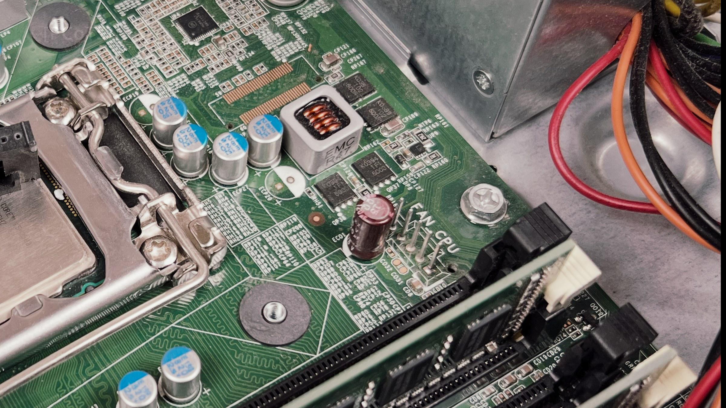 The FAN CPU header — ordinary pins in a scarier plastic shell The FAN CPU header on the board, up close